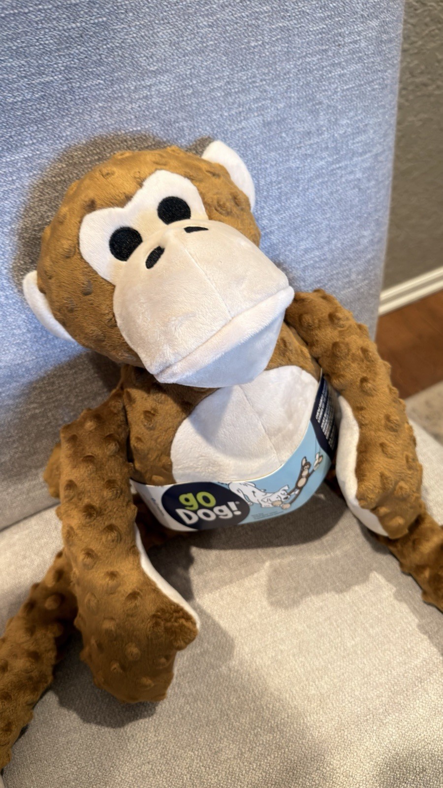 goDog Checkers Plush Monkey Dog Toy with Squeaker Brown Durable Soft Chew Toy
